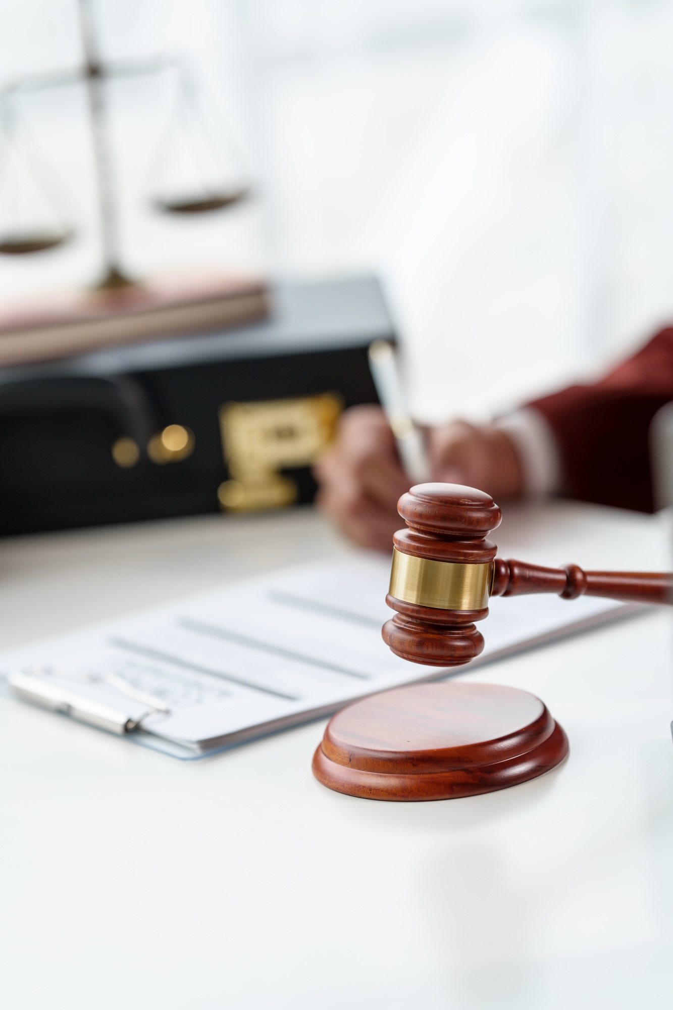 Business man hands close up working with contract lawyers specialize in dealing with legal issues