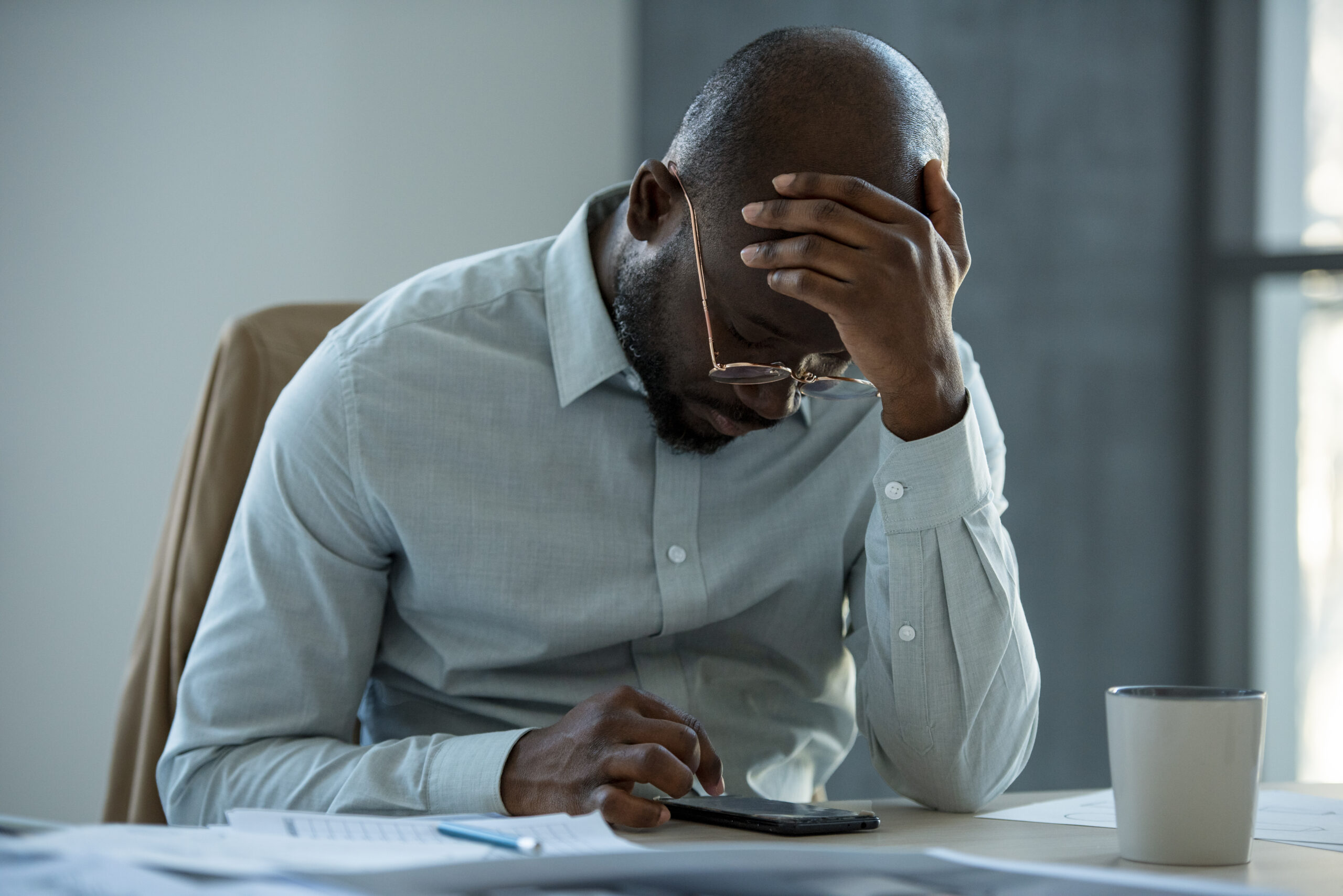 A frustrated employee before quitting work under constructive discharge in North Carolina.